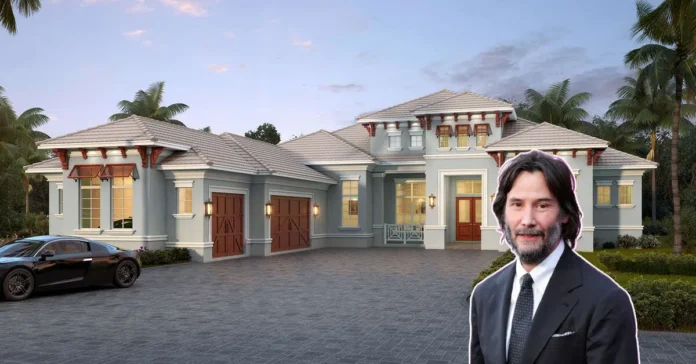 Keanu Reeves House Aerial shot of Keanu Reeves house nestled in Hollywood Hills, featuring white facade and infinity pool with LA skyline backdrop.