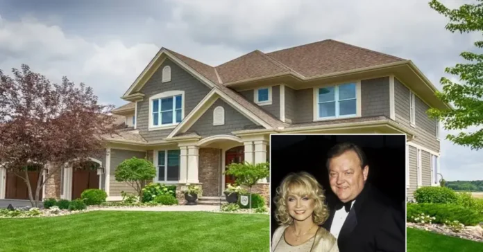 Nathaniel Mandrell Dudney House exterior showing massive log construction and porches
