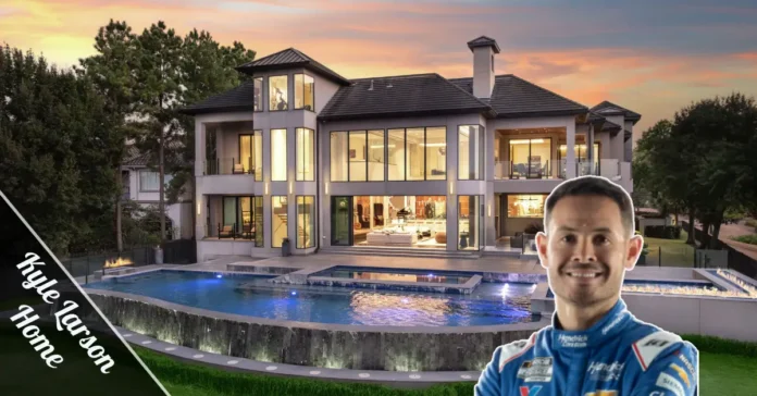 Kyle Larson Home front entrance in Mooresville NC showing tall doorframe with warm lighting and modern elegant design