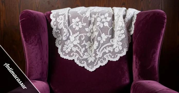 Antimacassar draped over modern sofa headrest for vintage furniture protection