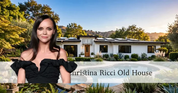 Exterior view of Christina Ricci's old house in Woodland Hills, a 2,718 sq ft mid-century traditional home at 4995 Campo Rd with a Juliet balcony and lush hillside landscaping.