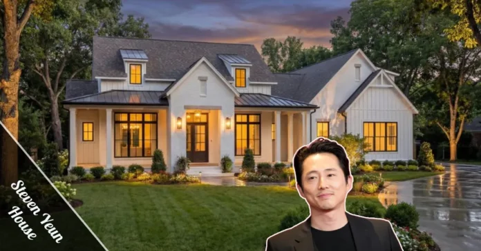 Steven Yeun House exterior featuring floating roofline, tropical garden, and wrought iron gates in Pasadena, CA