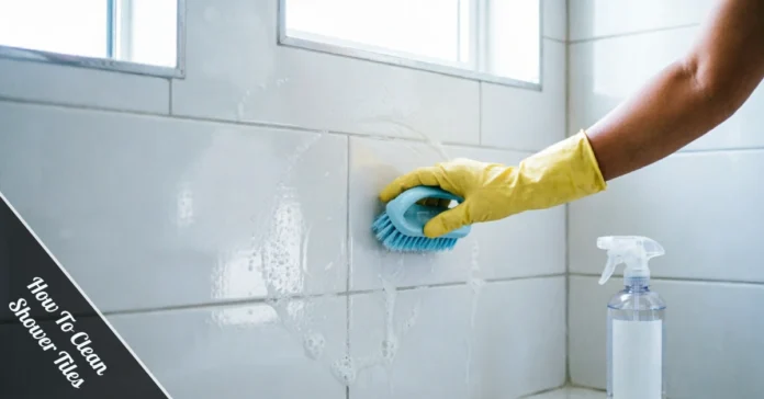 Hand scrubbing clean shower tiles with a soft brush and cleaner