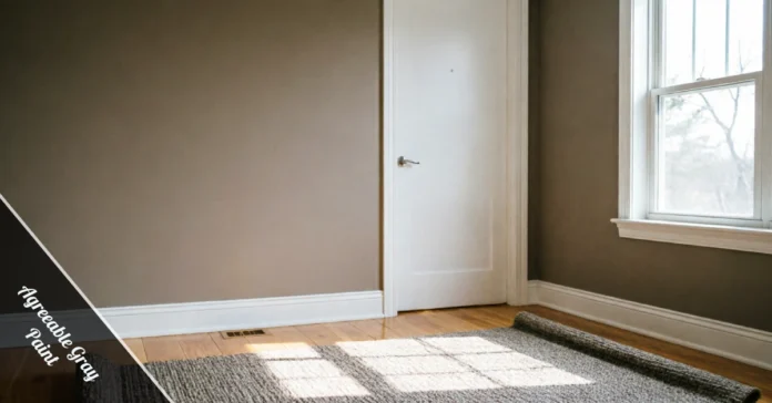 Agreeable Gray Paint wall in a living room with white trim and oak flooring