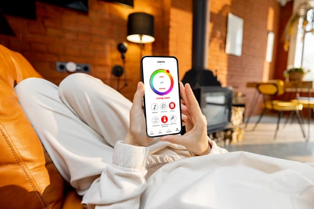 smart home system app on phone controlling living room lights without rewiring