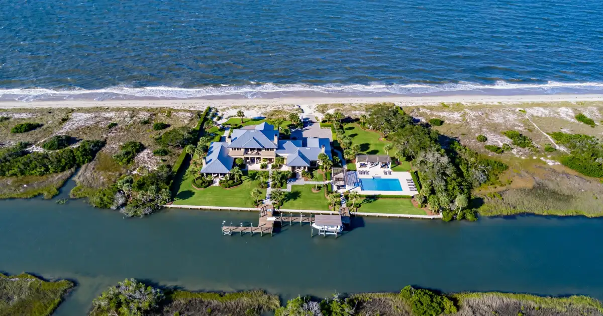 Aerial view of a waterfront Manalapan estate with ocean and Intracoastal frontage